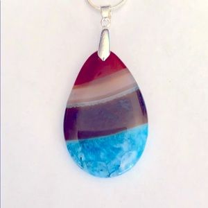 A brown and blue necklace